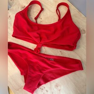 Frankie’s Bikini Red Ribbed and Knotted Bikini! Top and bottoms are size Medium